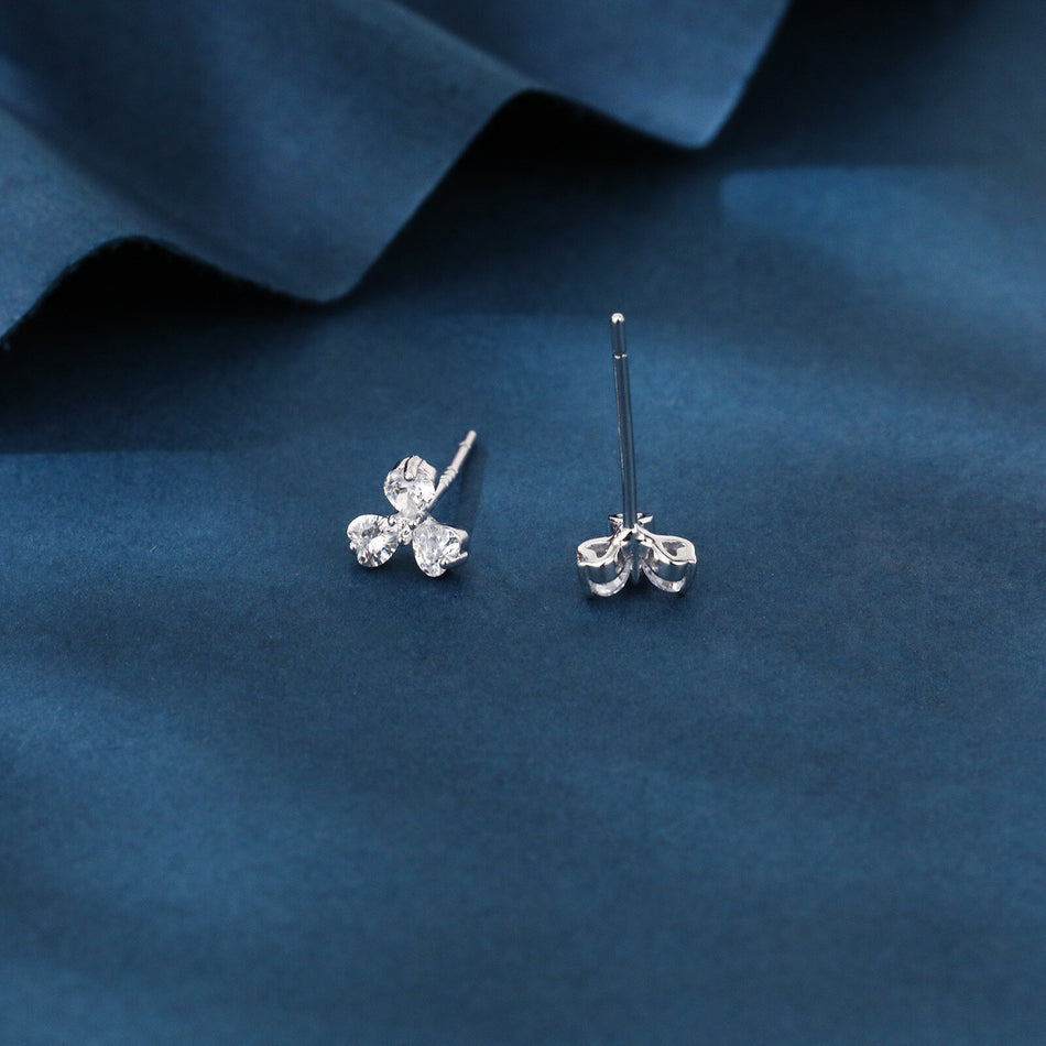 925 Sterling Silver Elegant Floral Stud Earrings With Sparkling Gemstones On Velvet Background