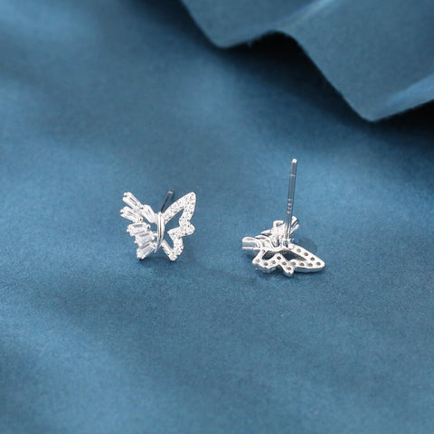 925 Sterling Silver Elegant Zircon Butterfly Stud Earrings On Blue Velvet Background