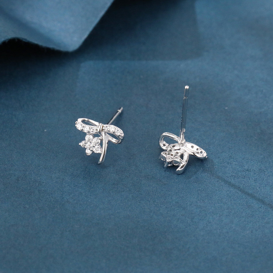 925 Sterling Silver Elegant Silver Bow Earrings With Zircon-accented Flowers On Blue Velvet
