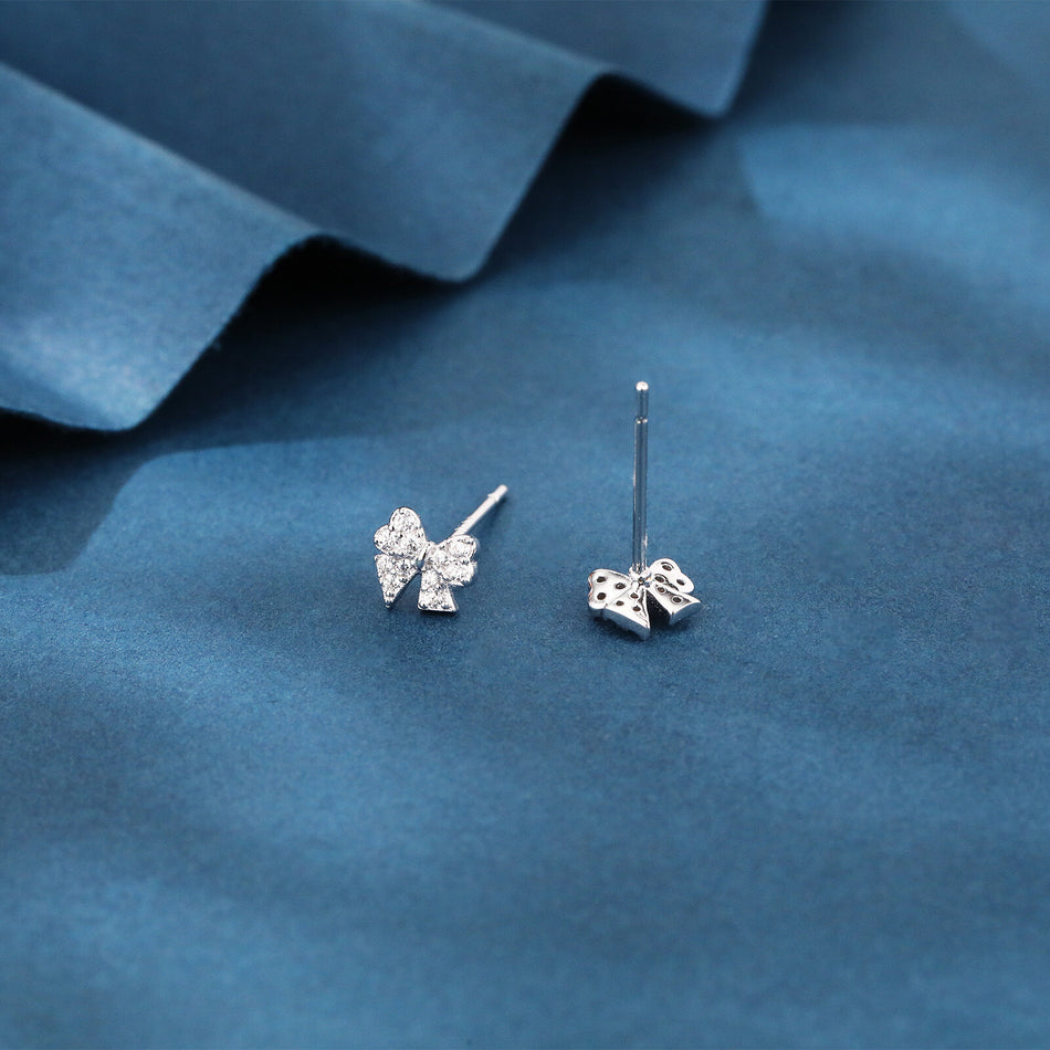925 Sterling Silver Elegant Butterfly Zircon Earrings On Dark Blue Velvet Background