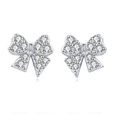 925 Sterling Silver Elegant Butterfly Zircon Earrings On Dark Blue Velvet Background