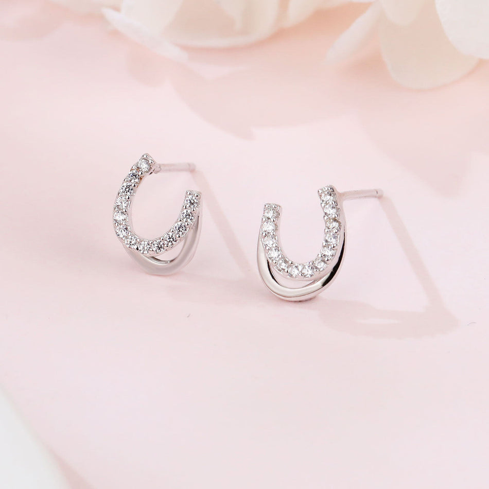 925 Sterling Silver **title:** Elegant Horseshoe Zircon Stud Earrings In Sterling Silver