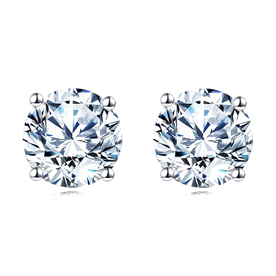 925 Sterling Silver Elegant Sparkling Moissanite Stud Earrings In Plated with White Gold On Blush Pink Backdrop