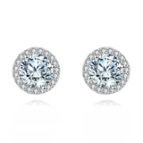 925 Sterling Silver Elegant Moissanite Halo Stud Earrings On Black Wood With Teal Background