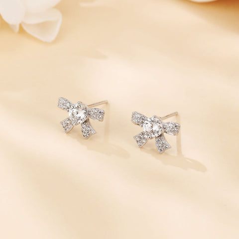 925 Sterling Silver Elegant Moissanite Bow Stud Earrings In Plated with White Gold Setting