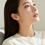 925 Sterling Silver Elegant Moissanite Bow Stud Earrings In Plated with White Gold Setting