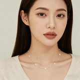 925 Sterling Silver Asymmetric Pearl Necklace In Sterling Silver: Modern Elegance Redefined