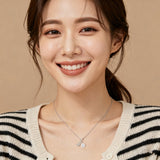 925 Sterling Silver Elegant Moissanite Ribbon Necklace With Silver Chain And Sparkling Leaf Accents