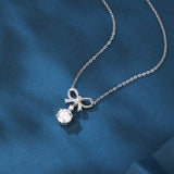 925 Sterling Silver Elegant Moissanite Bow Necklace With Triple Drop Design
