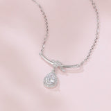 925 Sterling Silver Elegant Zircon Teardrop Necklace With Bow Accent In Sterling Silver