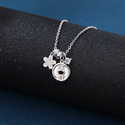 925 Sterling Silver **title:** Elegant Silver Necklace With Zircon Accents, Four-leaf Clover Charm, And Prosperity Symbol Pendant
