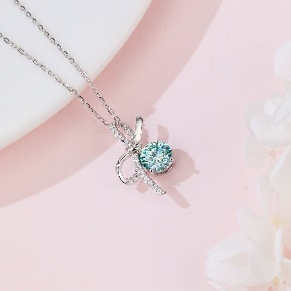 925 Sterling Silver Elegant Silver Bow Pendant Necklace With Light Blue Moissanite Centerpiece
