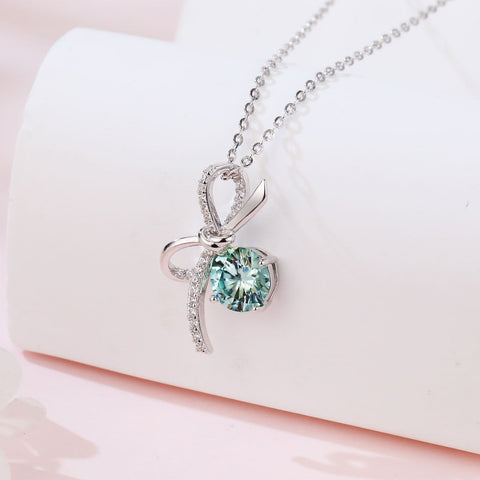 925 Sterling Silver Elegant Silver Bow Pendant Necklace With Light Blue Moissanite Centerpiece